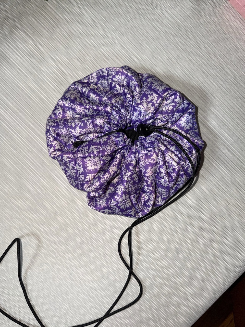 Lay-n-Go Cosmo Makeup bag in the Purple and White Damask print